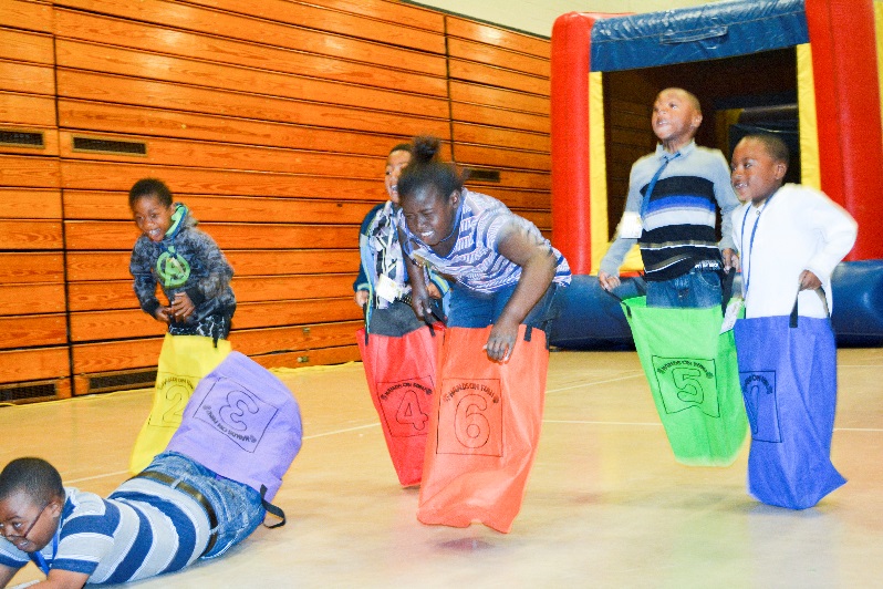 Children competed in sack races.